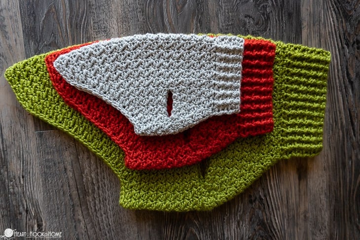 Dove Heather, Paprika, and Avocado colorways of an extra small, small, and medium examples of the Dandy Dog crochet pattern.